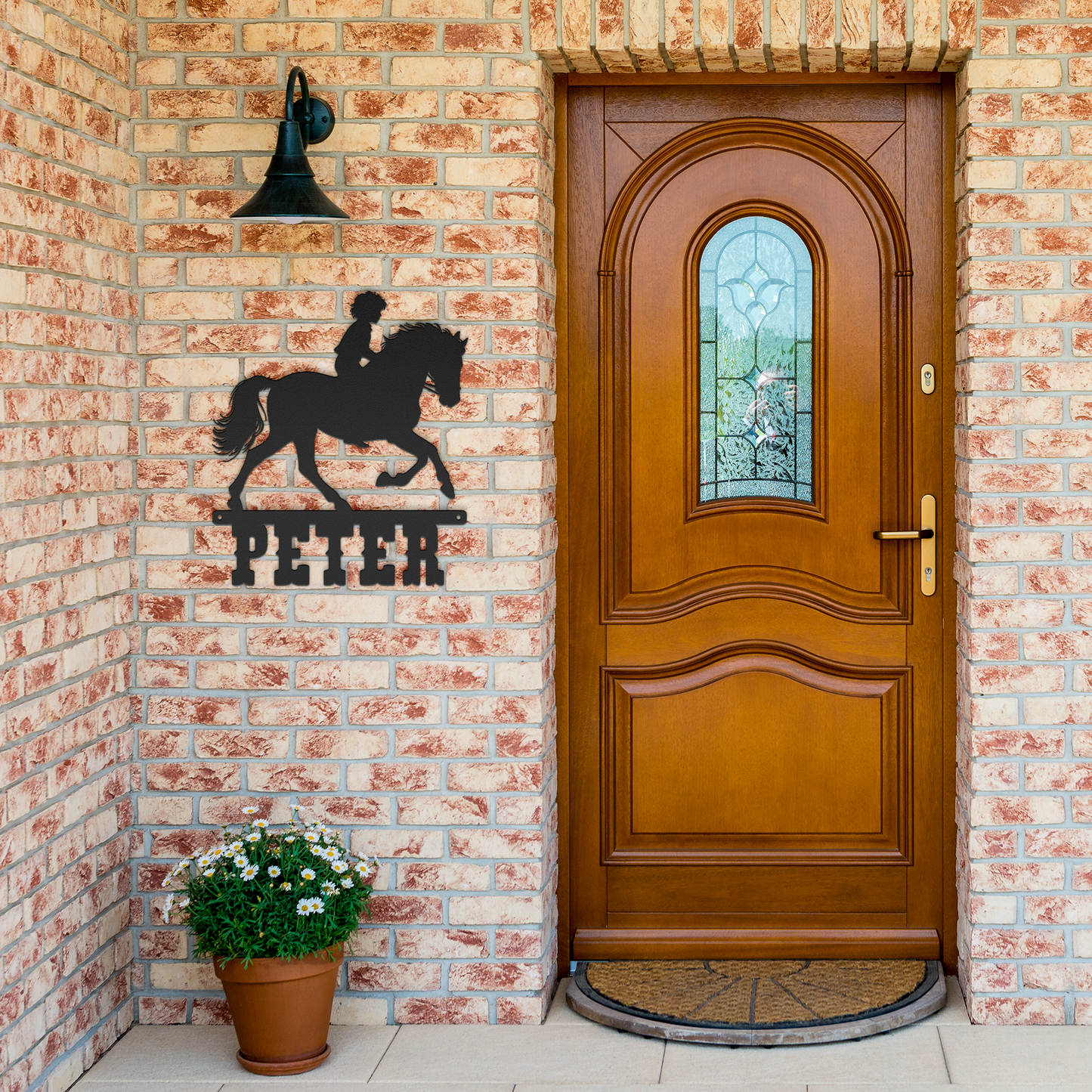 Boy_Riding_Black_Brick_Entrance_Mockup.png