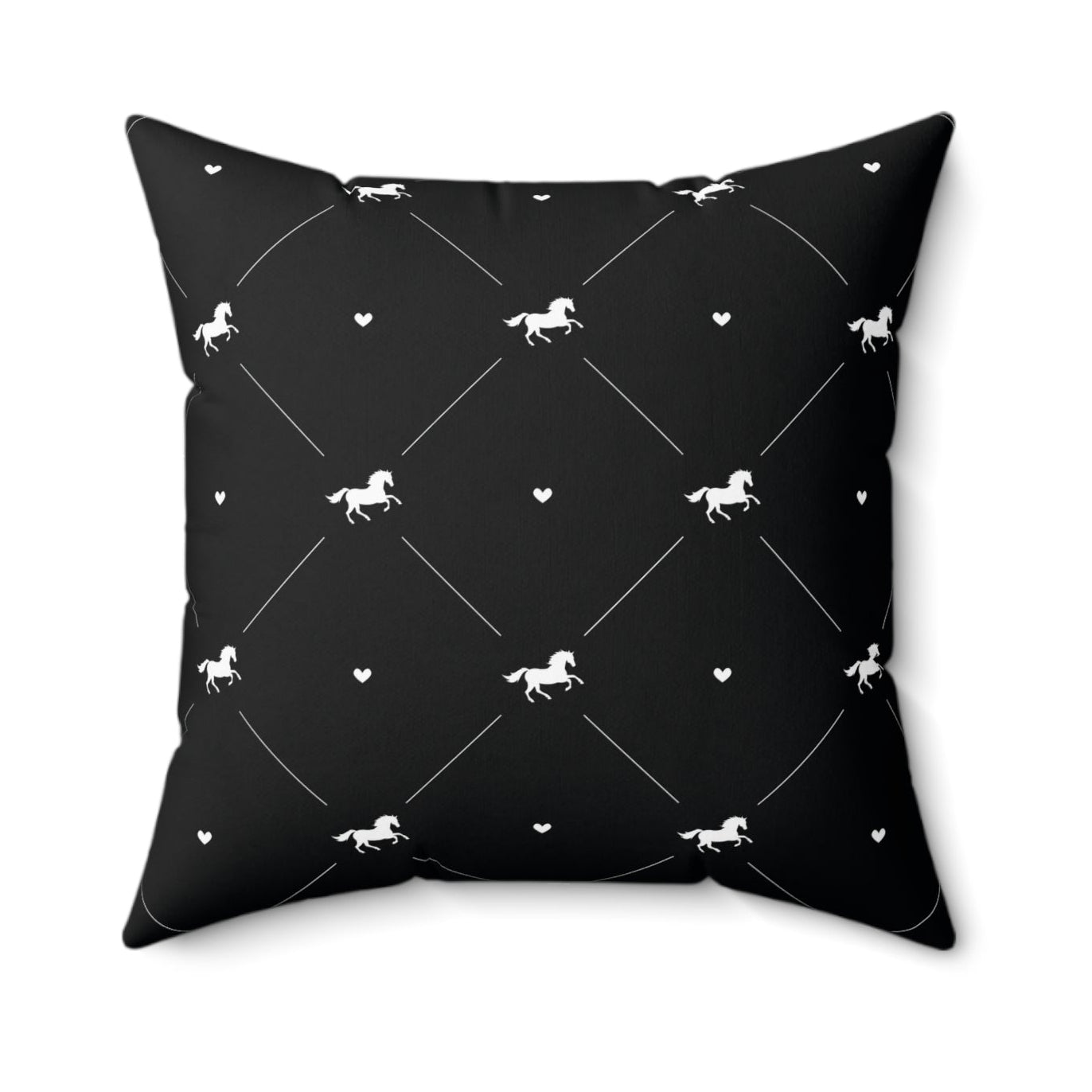 Black pillow with white horse pattern on a white background