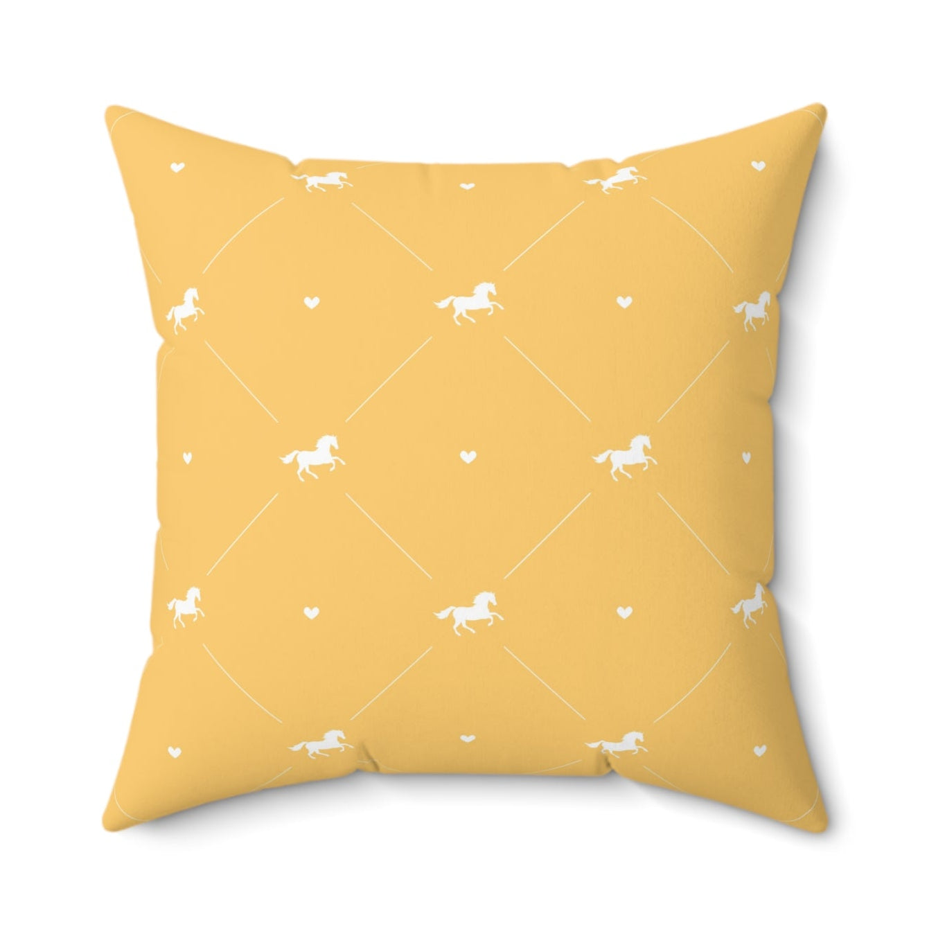 Yellow pillow with small white patterns on a white background