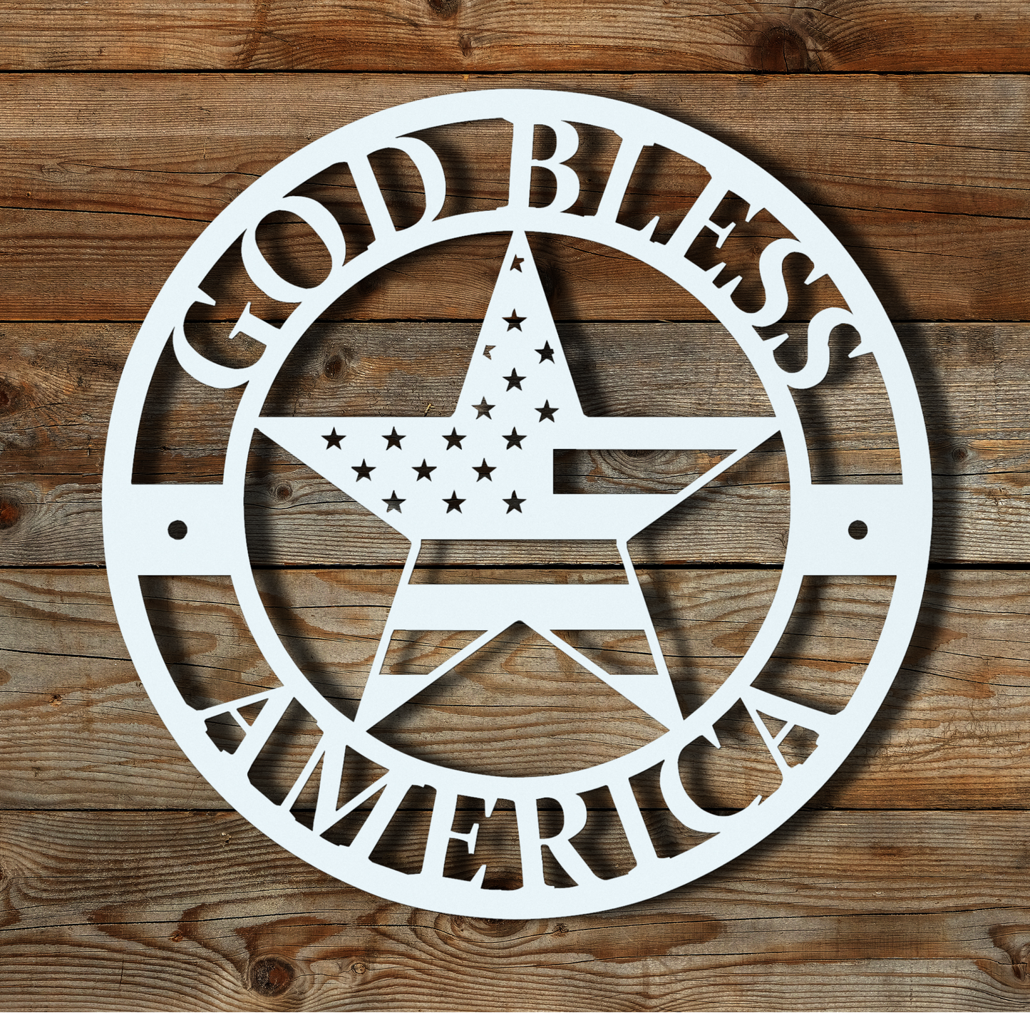 Circular metal wall sign with a star and the words “God Bless America,” 
